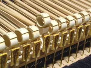 The Cristofori fortepiano appears at first glance to be an Italian harpsichord, but the action inside is quite different … hammers with glued paper cylinders